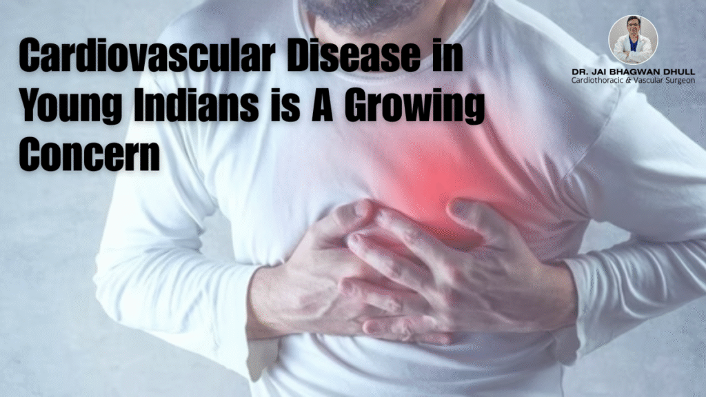Man clutching chest symbolizing heart attack, highlighting cardiovascular disease in young Indians – a growing concern discussed by Dr. Jai Bhagwan Dhull, renowned Cardiothoracic and Vascular Surgeon.