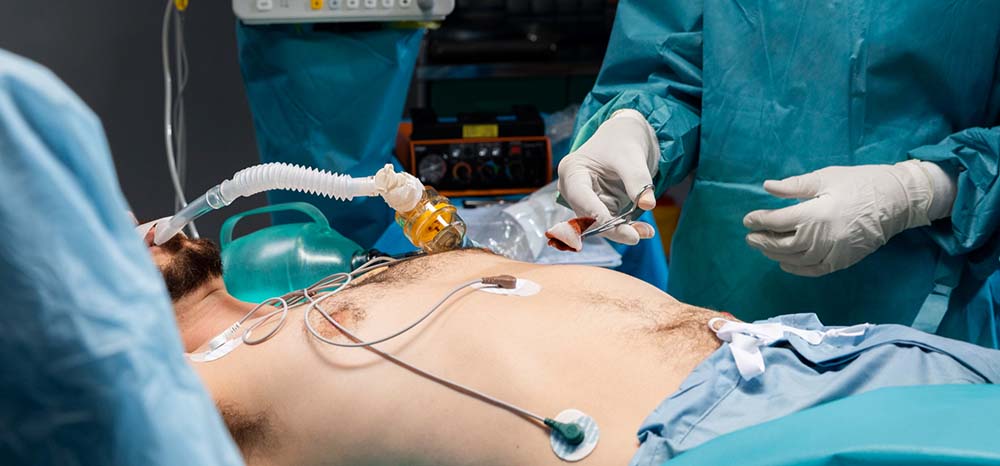 Patient undergoing minimally invasive cardiac surgery with medical instruments and monitoring equipment, performed under the expertise of Dr. Jai Bhagwan Dhull, cardiothoracic and vascular surgeon.