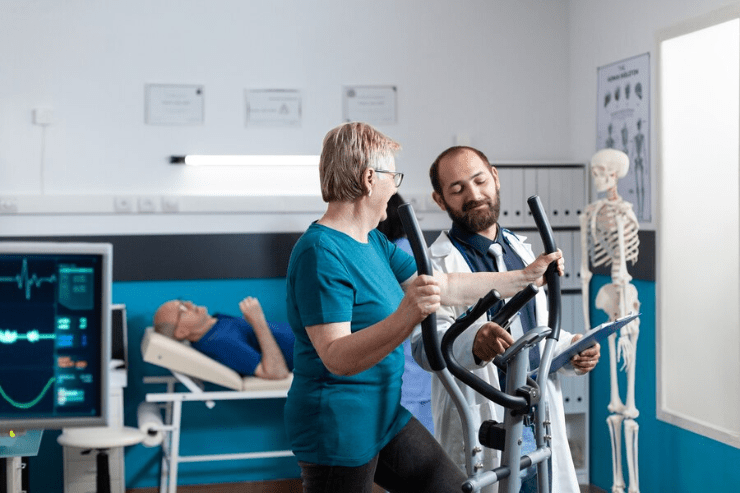 Patient undergoing cardiac rehabilitation exercise with doctor’s guidance, promoting recovery after heart surgery by Dr. Jai Bhagwan Dhull, expert cardiothoracic and vascular surgeon.