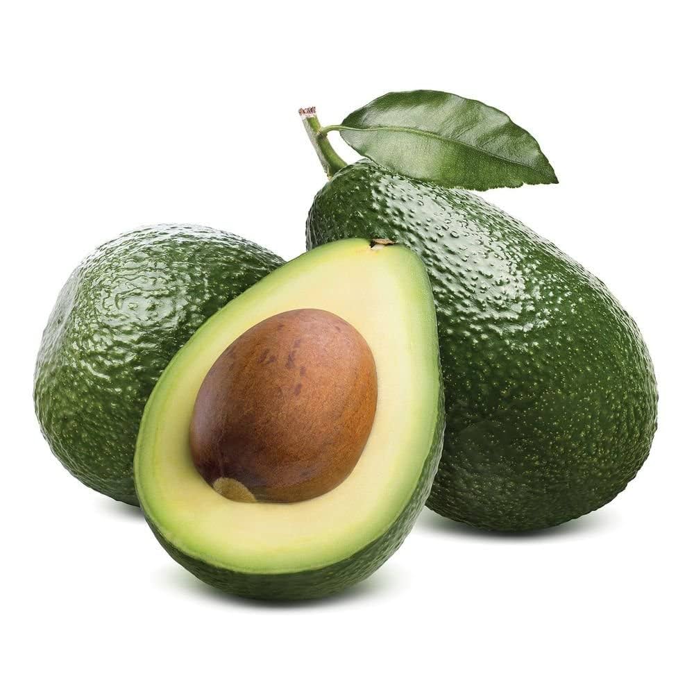 Fresh green avocados with one cut open showing seed and creamy texture, highlighting healthy diet benefits as emphasized by Dr. Jai Bhagwan Dhull.